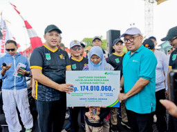 Peringati May Day, BPJS Ketenagakerjaan Serahkan Manfaat Rp174 Juta