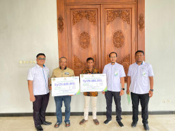 BPJS Ketenagakerjaan dan BAZNAS Kabupaten Madiun Serahkan Santunan Rp258 Juta