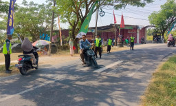 Dedikasi Satlinmas Kesongo Kawal Bazar UMKM TMMD 129 Bojonegoro
