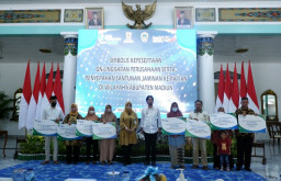 BPJAMSOSTEK Madiun Serahkan JKM Rp336 Juta, Terima Banyak BU di GN Lingkaran