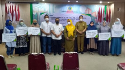 BPJAMSOSTEK Gresik Serahkan JKM Perangkat Desa Rp 378 Juta