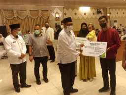 Ahli Waris Penjual Roti Dapat Beasiswa BPJAMSOSTEK Sampai Perguruan Tinggi