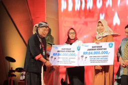 Peringati Hari Jadi Ponorogo, BPJS Ketenagakerjaan Serahkan Santunan Kematian