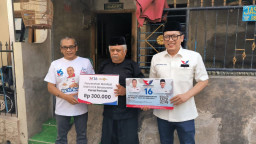 Andro Rohmana dan Yayak, Caleg Perindo Berikan Asuransi Bagi Warga Madiun