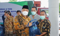 Eri Dampingi BPJamsostek Bagi Beras untuk Buruh