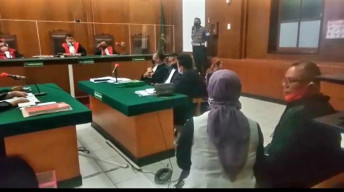 Dua Terdakwa Kasus ITE,  Walk Out dari Persidangan