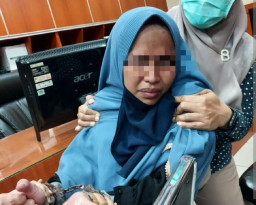 Suami Siti Elina Jadi Tersangka